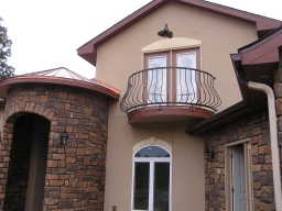 13.  Copper roof on turret,   copper balcony flashing,   through-wall flashing in stucco