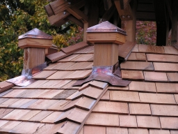 22.  Copper post caps, penetration flashing