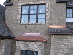 08.  Through-wall masonry   flashing on bay window, lower roof section