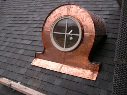 16. Copper dormer window, mantle clock design