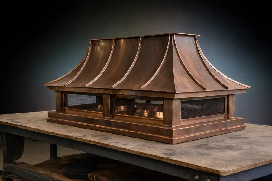 French Curve Chimney Cap — Aged Copper Finish