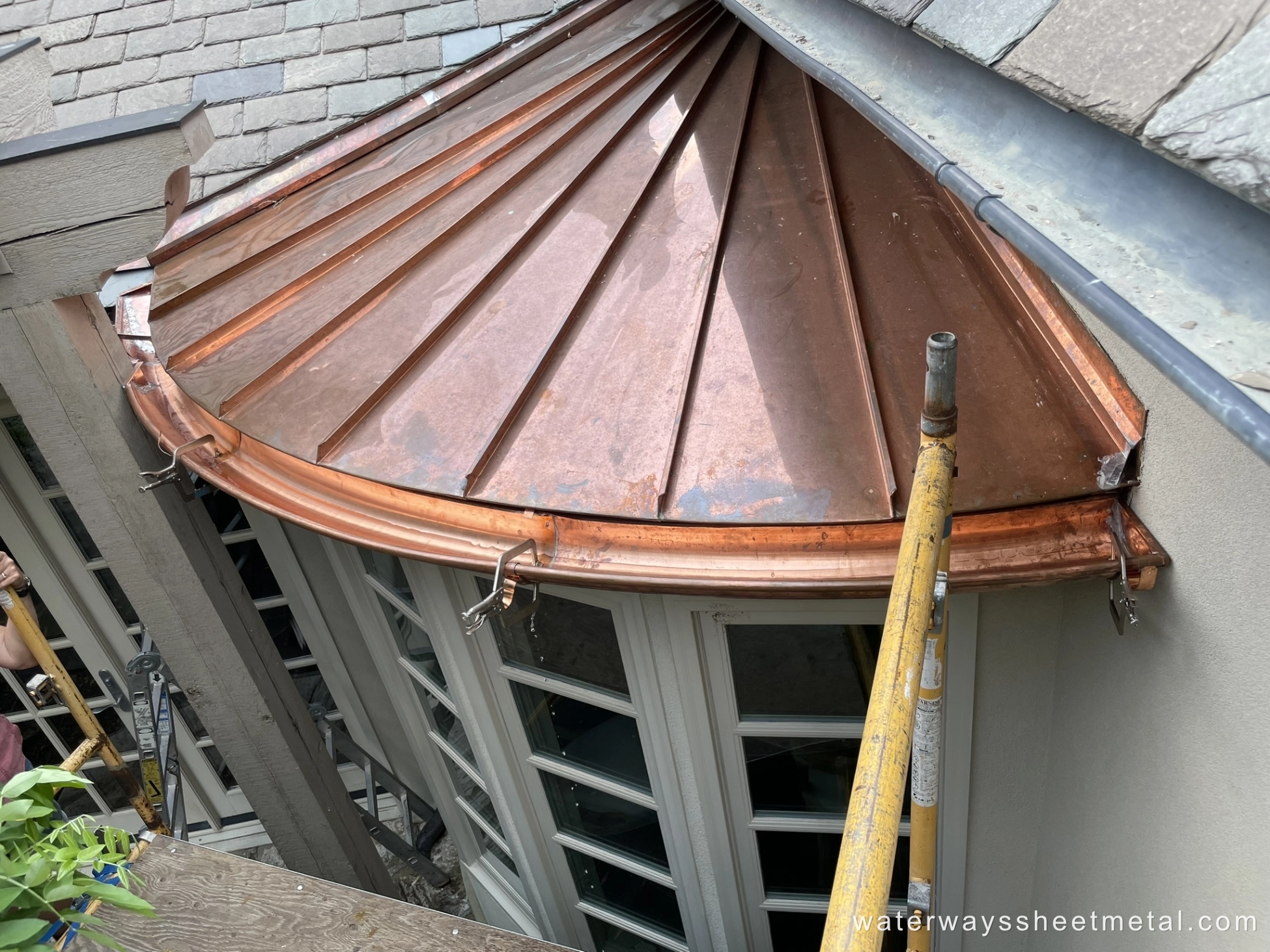 Breakfast Nook and Gutter in Copper Finished Roof view
